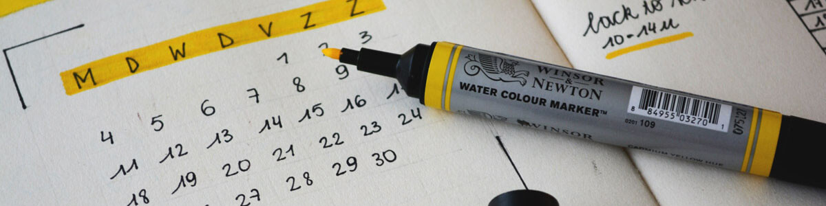 Papier-Kalender mit Marker